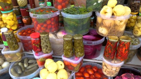 Fruit Vegetables Market With Various Colorful Pickle and Organic Vegetables Fruits at Farmers Market. Ripe Marinate Tomatoes Cucumbers Cabbage Peppers Mushrooms Dill Onions Apples Garlic 