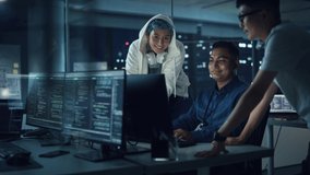 Diverse Team of Professionals Meeting in Office at Night: Brainstorming IT Programmers Use Computer Together, Talk Strategy, Discuss Planning. Software Engineers Develop Inspirational App Program - Powered by Shutterstock - Get 15% off with code: PIKWIZARD15