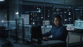 Night Office: Portrait of Handsome Indian Man in Working on Desktop Computer. Digital Entrepreneur Typing, Creating Modern Software, e-Commerce App Design, Programming. Stylish Authentic Person - Powered by Shutterstock - Get 15% off with code: PIKWIZARD15