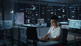 Night Office: Portrait of Handsome Japanese Man in Working on Desktop Computer. Digital Entrepreneur Typing, Creating Modern Software, e-Commerce App Design, Programming. Stylish Authentic Person - Powered by Shutterstock - Get 15% off with code: PIKWIZARD15
