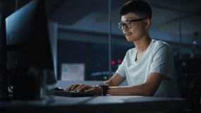 Night Office: Portrait of Handsome Japanese Man in Working on Desktop Computer. Digital Entrepreneur Typing, Creating Modern Software, e-Commerce App Design, Programming. Stylish Authentic Person - Powered by Shutterstock - Get 15% off with code: PIKWIZARD15