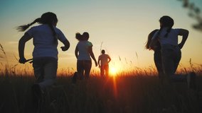 happy family. people in park children a kid together run in park at sunset silhouette. mom dad daughter and son run. happy family and little baby child summer. kid dream concept. fun children run - Powered by Shutterstock - Get 15% off with code: PIKWIZARD15