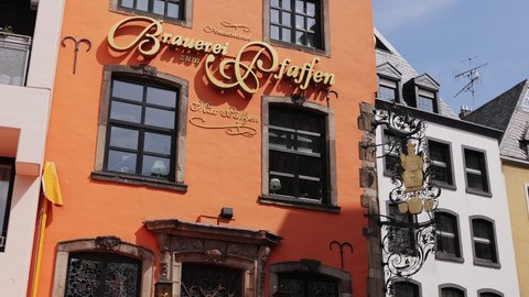 Popular pubs and brew houses in the city of Cologne - COLOGNE, GERMANY - JUNE 25, 2021