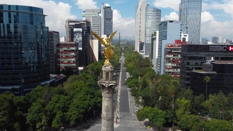 Mexico City, Mexico - August 30, 2021: Aerial view of the iconic monument Angel of Independence, after the finish of a restoration work, in Paseo de la Reforma avenue.