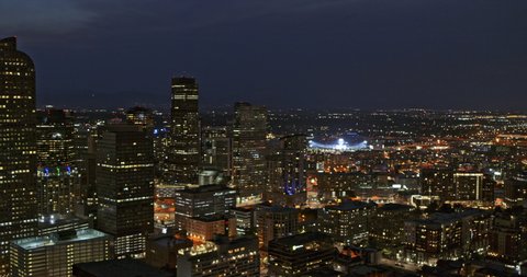 Denver Colorado Aerial v4 pan left shot of downtown cityscape at dusk night over North Capitol Hill area - DJI Inspire 2, X7, 6k - August 2020
