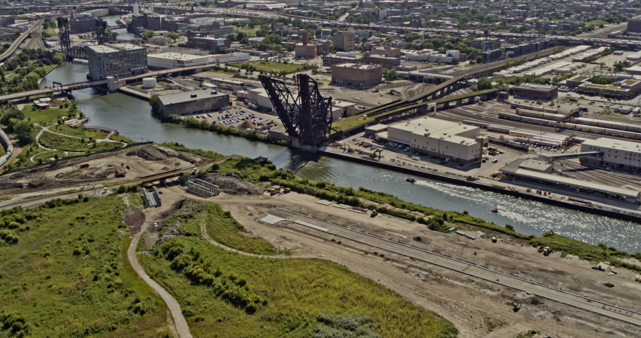 Chicago Illinois panning aerial from the industrial areas of West Side Loop and Rail Yards to the city skyline - 6k cinematic footage - August 2020