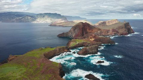 Madeira Islands, Portugal. Beautiful archipelagos in the middle of the Atlantic as seen from above. Breathtaking views of volcanic islets with charming village behind. High quality 4k footage