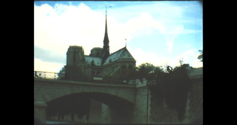 CIRCA 1977, Paris, Notre Dame Cathedral from the Siena River