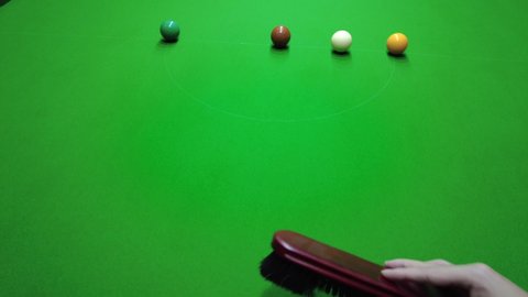 First person view , Brushing the snooker table in preparation for  player starting game , , indoor sport concept , 4K 59.94 fps footage