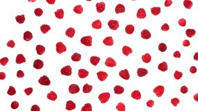 A large number of raspberries on a white background. Top view. Loop motion. Rotation 360. 4K UHD video footage 3840X2160