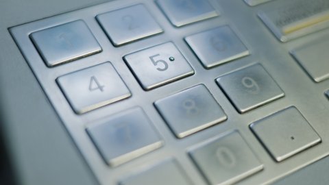 finger pressing enter button on a keyboard ATM EPP