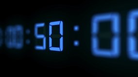 3D animation of blue 60 fps timecode led-LCD digits on black background with shallow DOF. - Powered by Shutterstock - Get 15% off with code: PIKWIZARD15