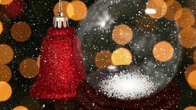 Snow falling over christmas bell spinning and snow globe against spots of light. christmas festivity and celebration concept - Powered by Shutterstock - Get 15% off with code: PIKWIZARD15