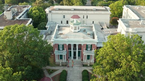 Historic Belmont Mansion on University campus in Nashville, TN. Descending aerial shot.