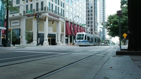Charlotte, North Carolina, USA - August 24, 2021: Lynx light rail trolley in operation in uptown Charlotte