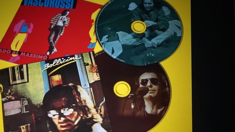 Rome, Italy - 01 September 2021, detail of the CDs and covers of Vado al massimo, fifth album by the Italian singer-songwriter Vasco Rossi, from 1982 and Bollicine, the sixth album from 1983.