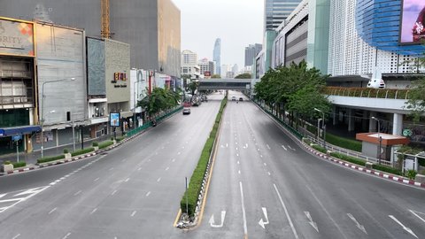 Bangkok, Thailand - April 6, 2020: Empty road scene in Bangkok. With the latest wave of COVID-19 continuing to have a serious impact on Thailand, many businesses have been looking for ways to survive.