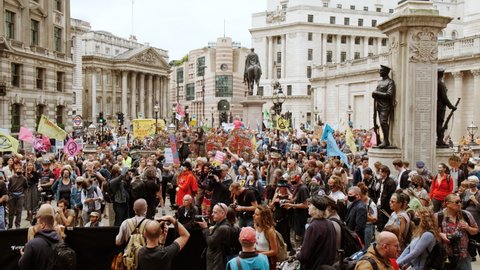 LONDON, circa 2021 - Extinction Rebellion supporters gather around the City of London, opposite the Bank of England, during a 2-week demonstration against Climate Change
