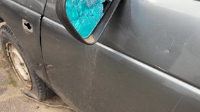 Broken car rearview mirror. Cracks in the glass. - Powered by Shutterstock - Get 15% off with code: PIKWIZARD15