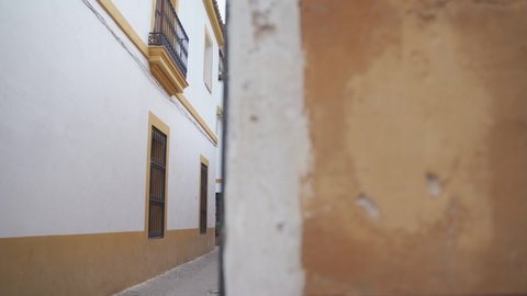 narrow street in the neighborhood of Santa Cruz in Seville