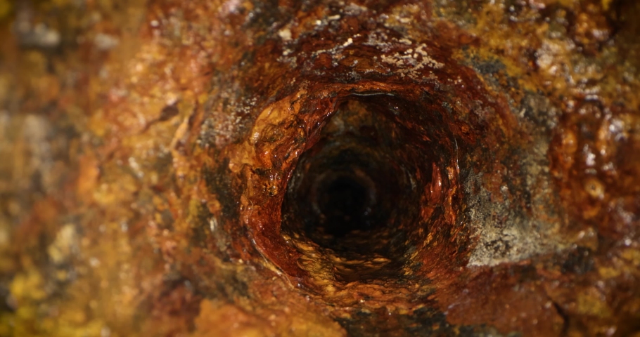 sliding inside old dirty sewer line pipe Royalty-Free Stock Footage #1078548005
