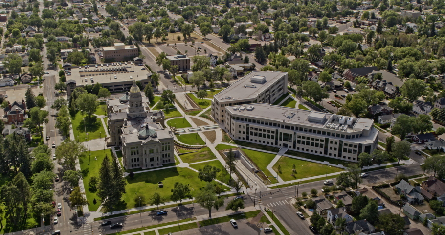 Cheyenne Wyoming Aerial v4 cinematic orbit shot capturing the state capitol building governor office and the vast expanse of cityscape - Shot with Inspire 2, X7 camera - August 2020