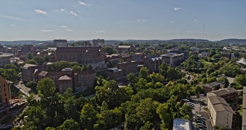 Knoxville Tennessee Aerial v19 fast tracking shot reveals neyland football stadium home of vols at university of tennessee during daytime - Shot with Inspire 2, X7 camera - August 2020
