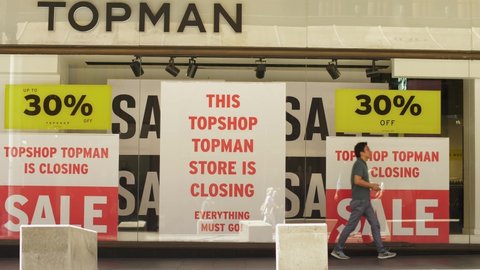 SYDNEY, NSW, AUSTRALIA. MARCH 01 2020. Slow motion pedestrians, Topman Store Closing Down.