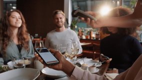 Friends splitting the bill in restaurant - Powered by Shutterstock - Get 15% off with code: PIKWIZARD15