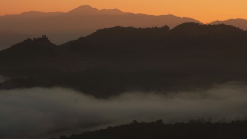 Time Lapse, Beautiful landscape sunlight with fog at morning, Baan jabo viewpoint. Mae Hong Son, Baan JABO one of the most amazing Mist in Thailand.