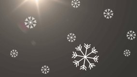 Animation of snow falling and christmas decorations over winter scenery. christmas, tradition and celebration concept digitally generated video.