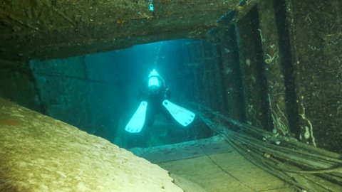 MEDITERRANEAN SEA, CYPRUS - AUGUST, 2021: Inside hold of the shipwreck Swedish ferry MS Zenobia. Wreck diving. Mediterranean sea, Cyprus