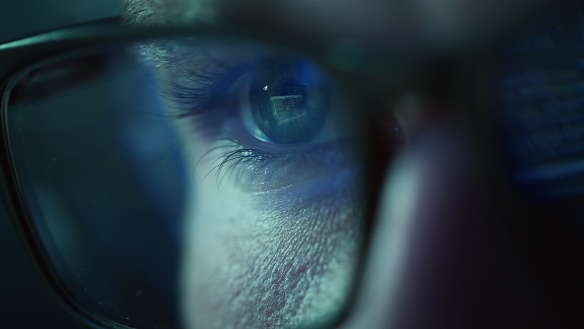 Close-up Portrait of Software Engineer Working on Computer, Line of Code Reflecting in Glasses. Developer Working on Innovative e-Commerce Application using Big Data AI.Stylish Macro Shot of Eye, Lens Royalty-Free Stock Footage #1078602005