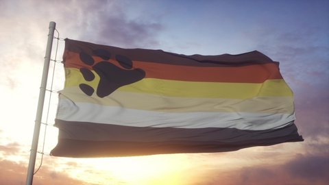 Bear Brotherhood pride flag waving in the wind, sky and sun background