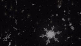 Animation of confetti and snowflakes over black background. christmas, winter, tradition and celebration concept digitally generated video.