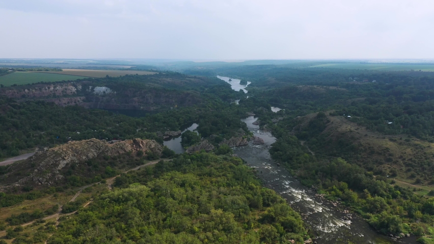 Landscape of the river and granite rocks aerial view.