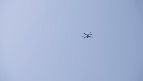 a small quadcopter in the sky