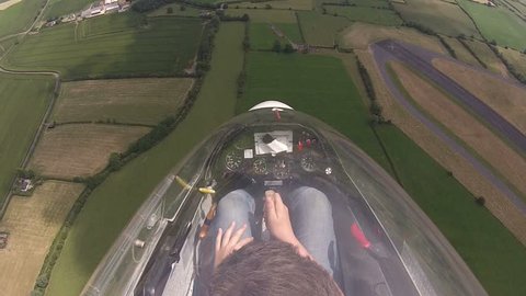 Glider / sailplane  aerobatics over English countryside