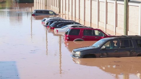 New Brunswick, New Jersey - September 2, 2021: Parked cars submerged underwater in the aftermath of Tropical Storm Ida.