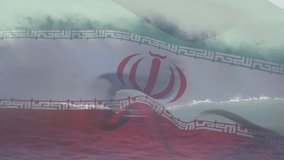 Animation of flag of iran waving over crashing waves in sea. patriotism, independence and celebration concept digitally generated image. - Powered by Shutterstock - Get 15% off with code: PIKWIZARD15