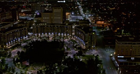 Omaha Nebraska Aerial v4 pan left profile shot of the popular turner park and the 7 buildings in midtown crossing at night - Shot with Inspire 2, X7 camera - August 2020