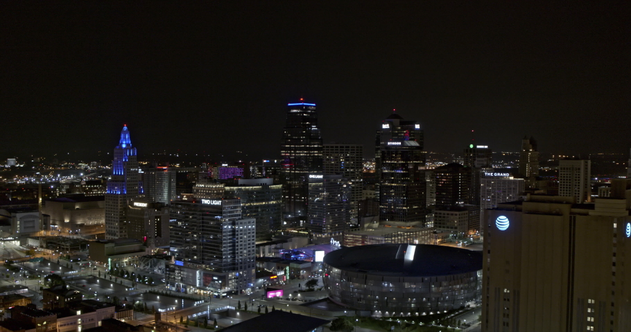 Kansas City Missouri Aerial v1 establishing shot of drone hovering around central business district at night capturing illuminated buildings - Shot with Inspire 2, X7 camera - August 2020
