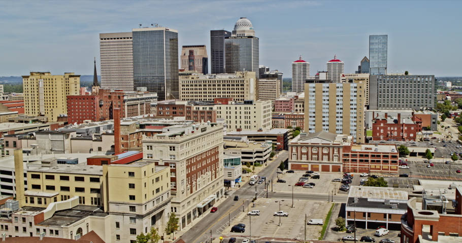 Louisville Kentucky Aerial v21 pedestal dolly in contrast shot from low rise buildings area toward high rise skyscrapers next to Ohio river - Inspire 2, X7 camera - August 2020