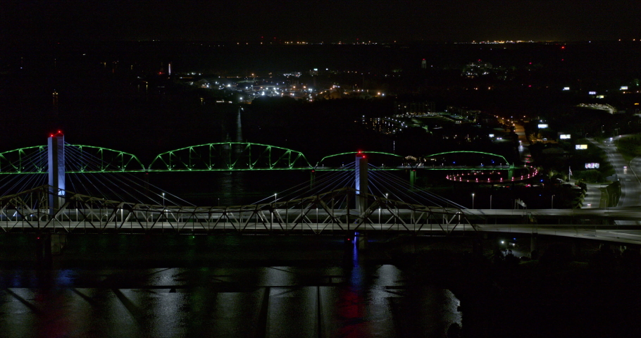 Louisville Kentucky Aerial v9 tracking night shot along Kennedy memorial bridge with Lincoln and Big four bridges in the background - Shot with Inspire 2, X7 camera - August 2020
