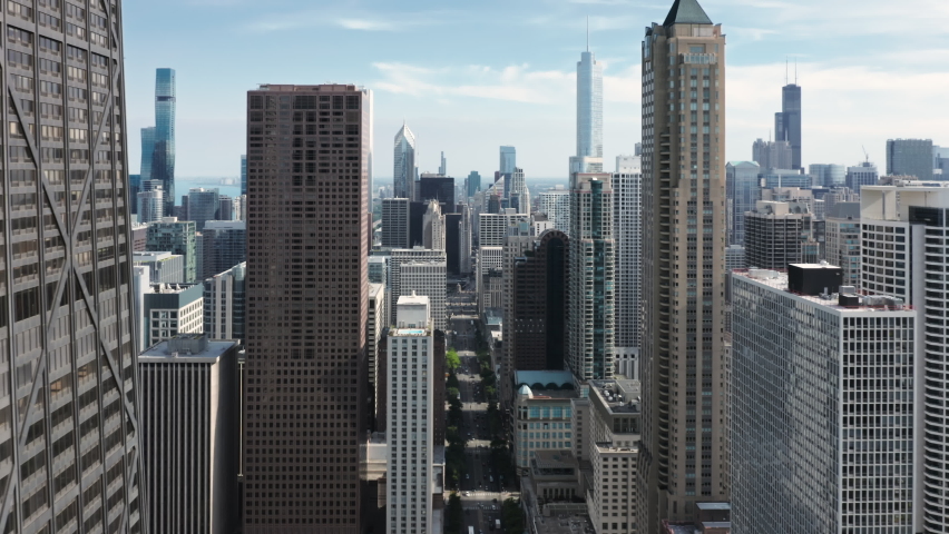 Contemporary urban cityscape view, drone b roll 4K footage. Cinematic glass concrete design business offices buildings in the center of the city. Modern downtown Chicago architecture, summer aerial