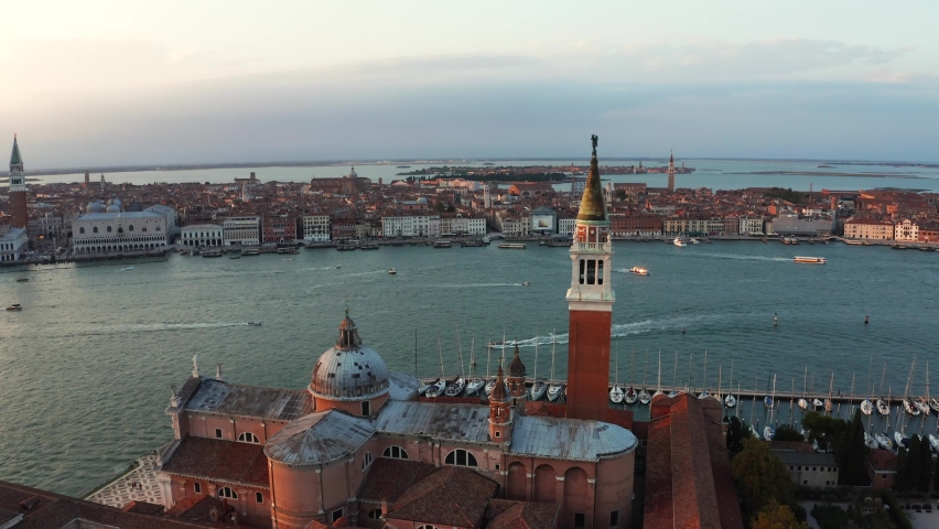 Panorama aerial photo of San Giorgio Maggiore island in the middle of Venetian Lagoon, northern Italy, Venice, Giudecca canal.