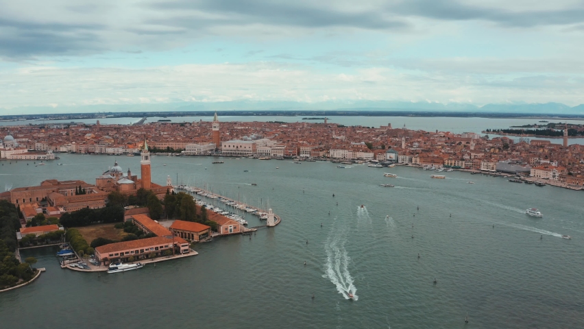 Panorama aerial photo of San Giorgio Maggiore island in the middle of Venetian Lagoon, northern Italy, Venice, Giudecca canal.