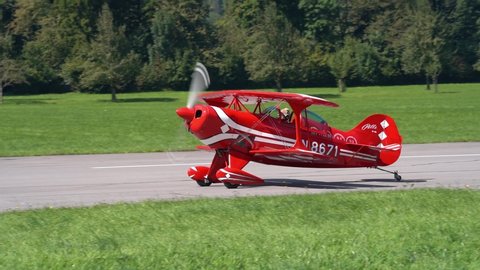 Red Pitts Special S1-S double decker airplane taxiing at Mollis Airshow on a sunny late summer afternoon. Movie shot September 4th, 2021, Mollis, Switzerland.