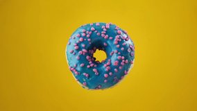 Various colorful donuts. Different delicious donuts changing at yellow background. Stop motion. Chocolate, pink, blue glazed donuts. Unhealthy food. Bakery and food concept in 4K, UHD - Powered by Shutterstock - Get 15% off with code: PIKWIZARD15