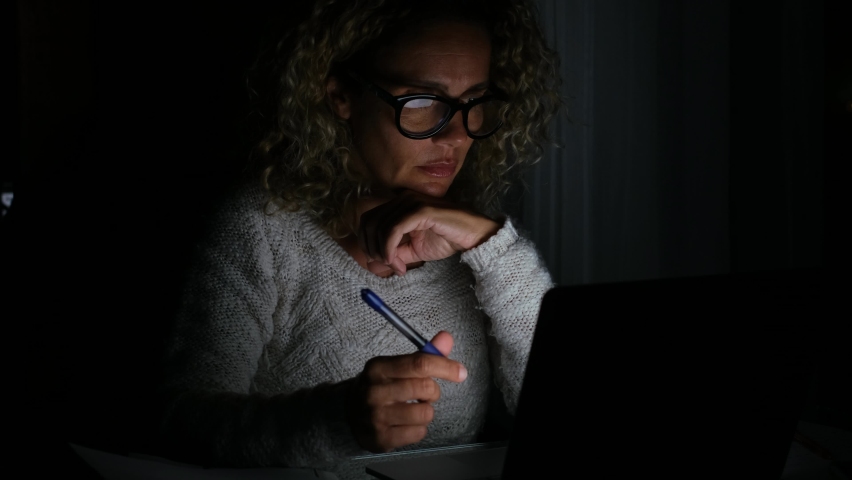 Tired and frustration woman working and using laptop at late night. Businessmwoan upset to have work too much overtime.  Stressed businesswoman person at home.
 | Shutterstock HD Video #1078676927